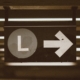 black and white arrow sign